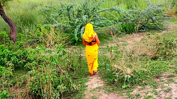 indian aunty in yellow saree drap