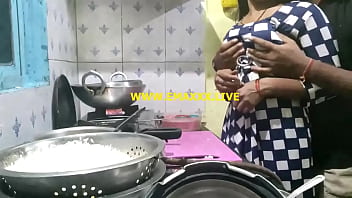hot young couple having sex in kitchen